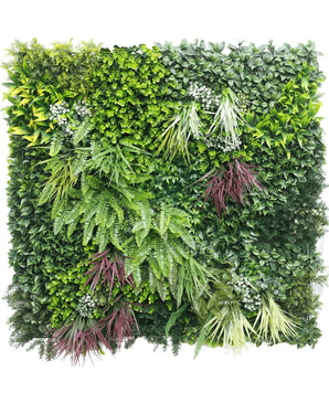 De Kunsthaag Paradise 100x100 cm UV is een verticale tuinmuur met dicht groen gebladerte met varens, gevarieerde bladeren en kleine witte bloemen in een vierkant ontwerp, met verschillende vormen en texturen.