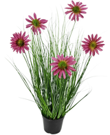 De Kunst Grasplant Chrysant 60 cm brandvertragend is een zwarte pot met groene, grasachtige bladeren en zes roze chrysantenbloemen met een geel hart op lange stelen.